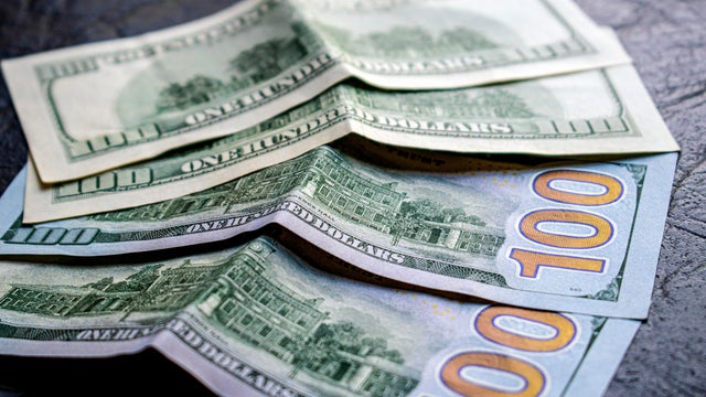 100 dollar cash bills. Old design and new design. Money, economy, USA currency, tariffs. 